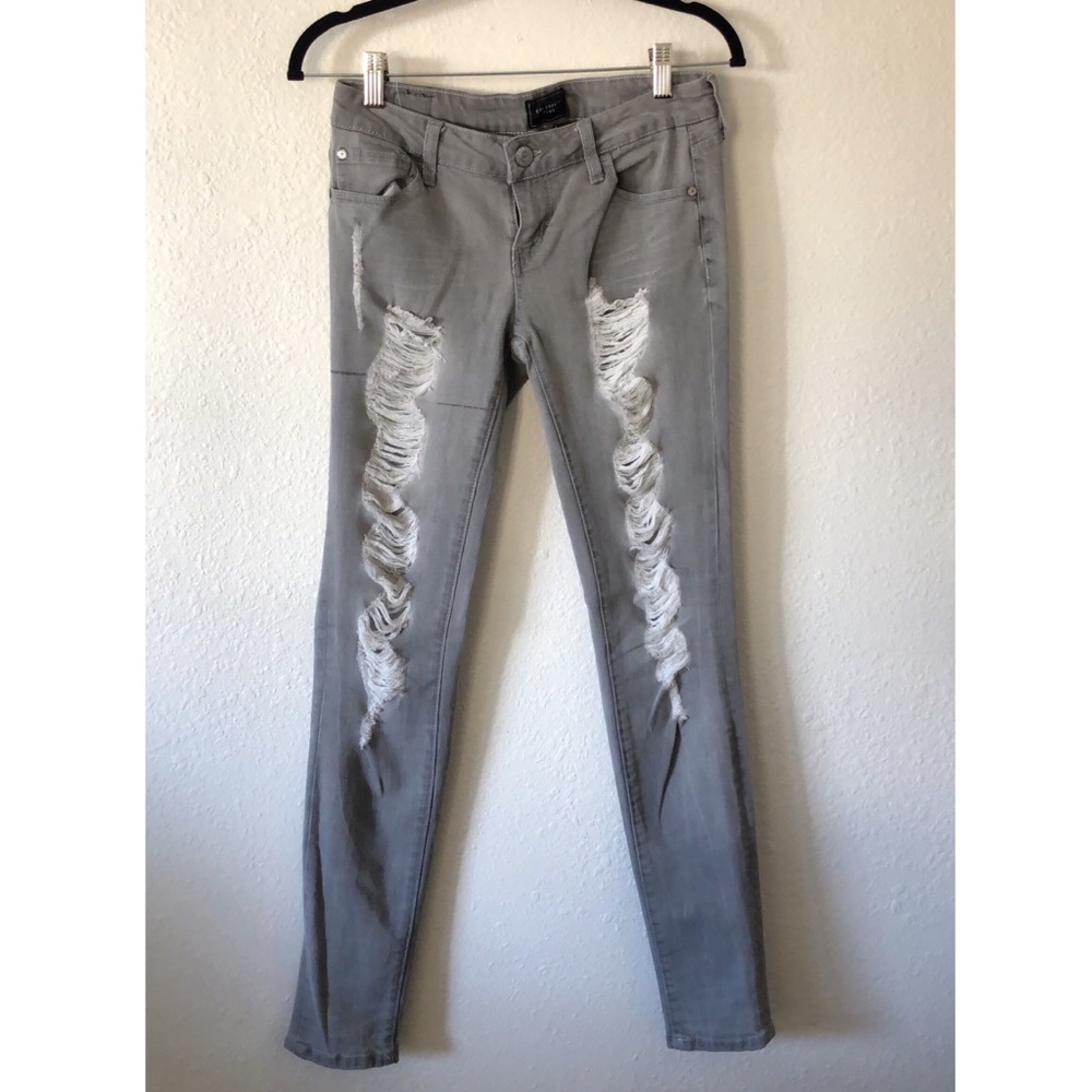 Celebrity pink ripped jeans